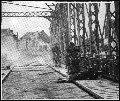 Belgian infantry rearguard on a canal bridge, heading for Antwerp